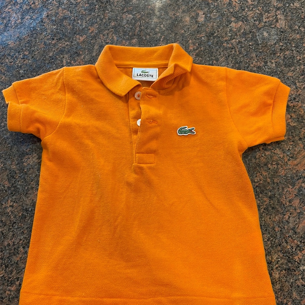 Size 1 baby shirt that is 12-18 months